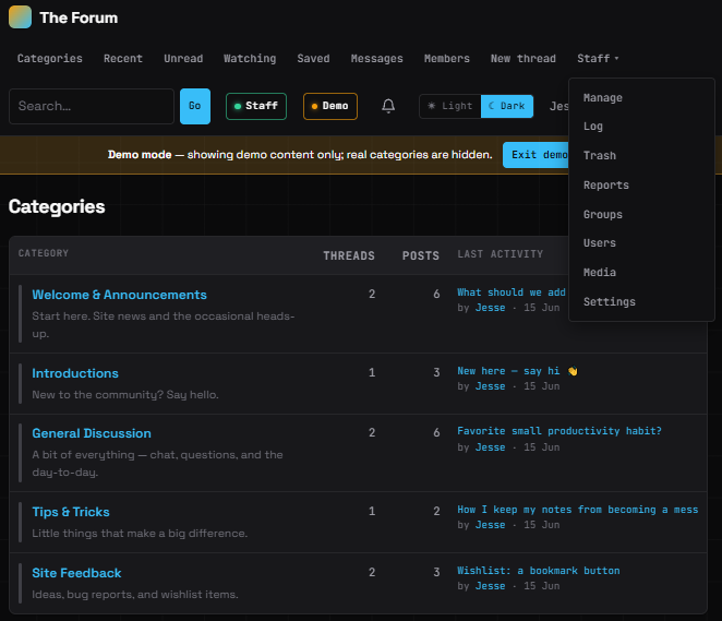 Desktop navigation for an admin: one clean row, with the eight moderation and admin links collapsed behind a single Staff dropdown. The open-reports count rides on the dropdown itself when something is waiting; demo mode has nothing open, so there is no badge here. Captured in demo mode.